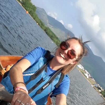 Swim guide on a kayak in a lake