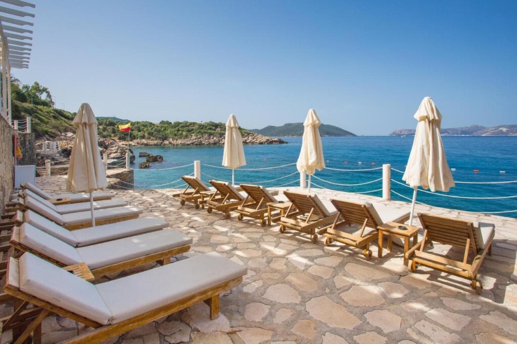 Aqua princess hotel in Turkey. View from the terrace. Sun loungers umbrellas and blue sea.