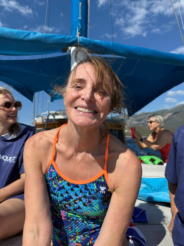 Woman smiling to the camera on boat in Kas Turkey