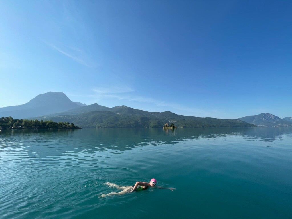 One swimmer swimming across Lake Serre Pancon